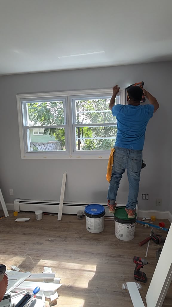 New replacement windows installed in Ridgewood while interior trim work continues